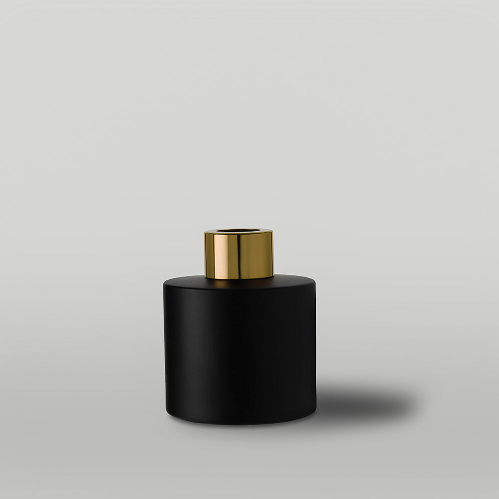 100ml Matt Black Diffuser gold top on a grey background