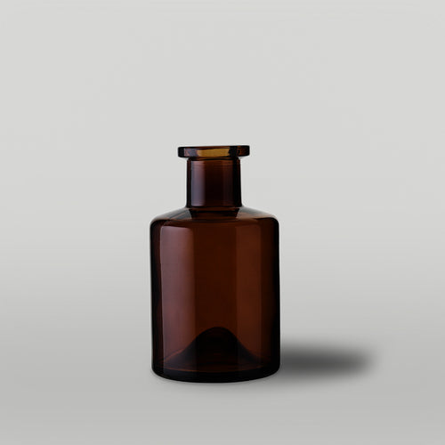 200ml Amber apothecary style diffuser bottle on a light gray background