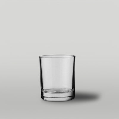 Clear glass 20cl Lotti candle jar on a gray background