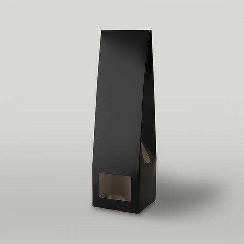 Black cardboard candle packaging on a light grey background