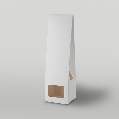 White candle packaging on a light grey background