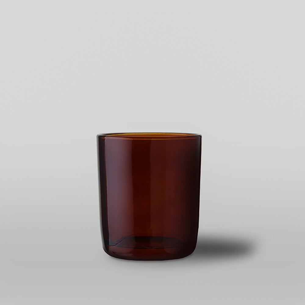 30cl amber Aria candle jar on a light grey background