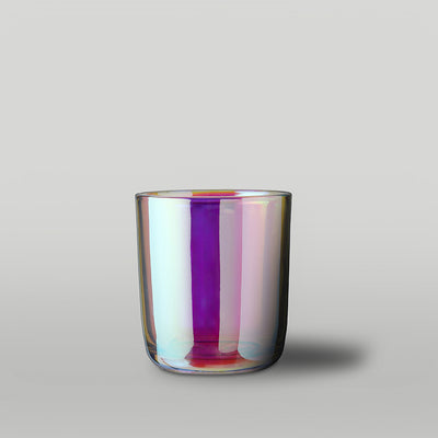 Irridescent 30cl Aria candle jar on a grey background