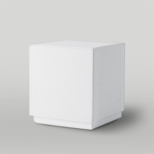 White candle box on a light grey background