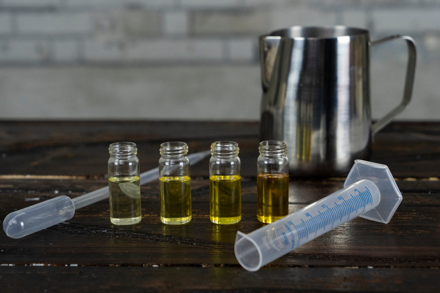 Sample fragrance oils, measuring equipment, pipette, measuring jug