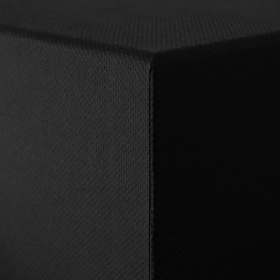 Close-up of a black textured candle box