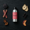 Black Plum & Rhubarb fragrance oil - Candle Shack aluminium bottle with dried botanicals on a dark slate background