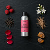 Black Raspberry & Peppercorn fragrance oil - Candle Shack aluminium bottle with dried botanicals on a dark slate background