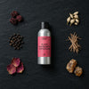 Black Raspberry & Peppercorn fragrance oil - Candle Shack aluminium bottle with dried botanicals on a dark slate background