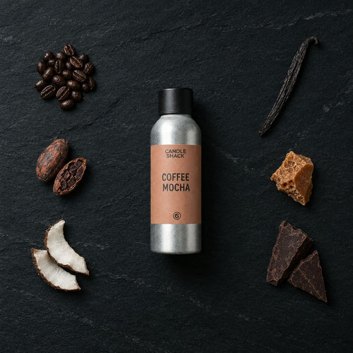 Coffee Mocha fragrance oil - Candle Shack aluminium bottle with dried botanicals on a dark slate background