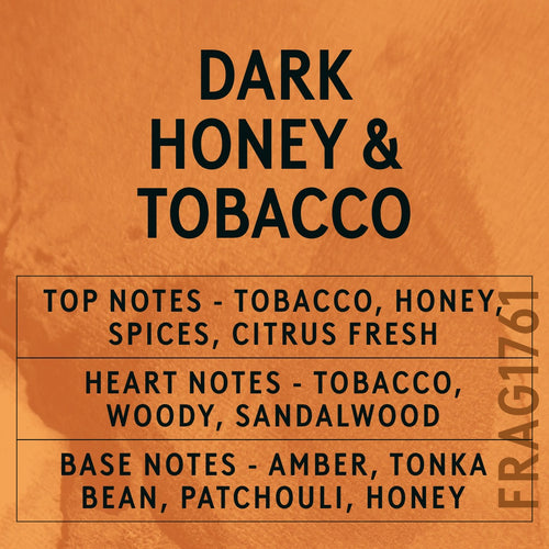 Dark Honey & Tobacco fragrance oil - Candle Shack aluminium bottle with dried botanicals on a dark slate background