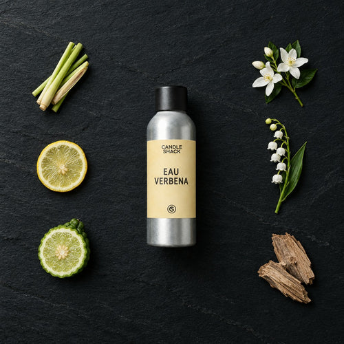Eau Verbena fragrance oil - Candle Shack aluminium bottle with dried botanicals on a dark slate background