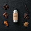 Espresso Martini fragrance oil - Candle Shack aluminium bottle with dried botanicals on a dark slate background