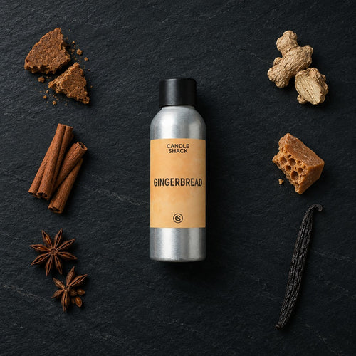 Gingerbread fragrance oil - Candle Shack aluminium bottle with dried botanicals on a dark slate background