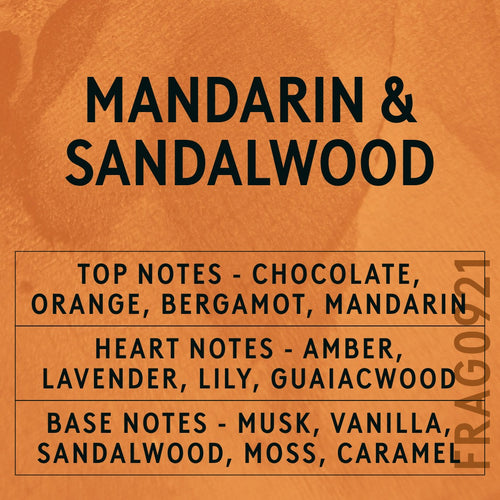 Mandarin & Sandalwood fragrance oil - Candle Shack aluminium bottle with dried botanicals on a dark slate background