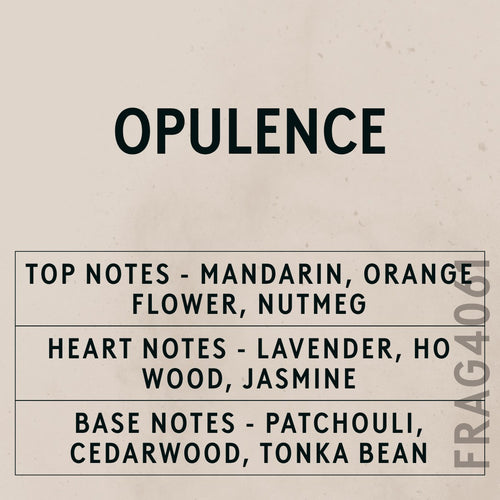 Opulence Natural Oil fragrance oil - Candle Shack aluminium bottle with dried botanicals on a dark slate background