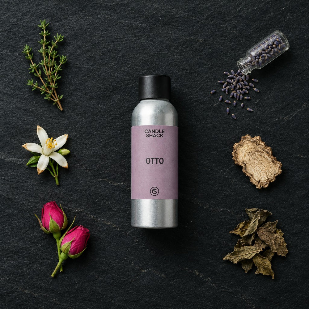 Otto Reed fragrance oil - Candle Shack aluminium bottle with dried botanicals on a dark slate background