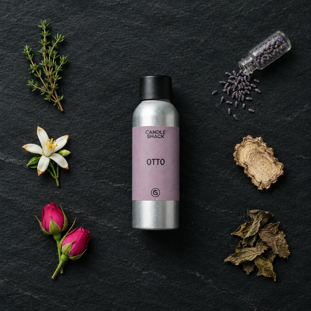 Otto Reed fragrance oil - Candle Shack aluminium bottle with dried botanicals on a dark slate background
