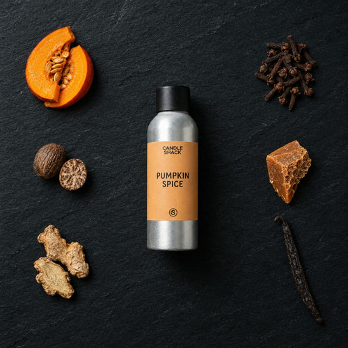 Pumpkin Spice fragrance oil - Candle Shack aluminium bottle with dried botanicals on a dark slate background