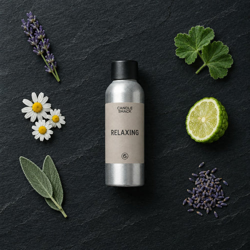 Relaxing Natural Oil fragrance oil - Candle Shack aluminium bottle with dried botanicals on a dark slate background