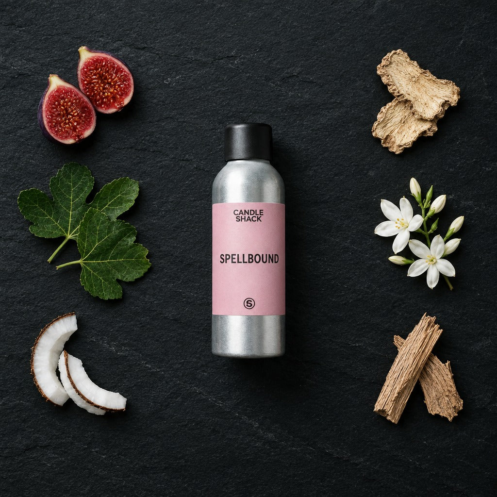 Spellbound fragrance oil - Candle Shack aluminium bottle with dried botanicals on a dark slate background
