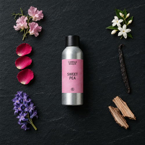 Sweet Pea fragrance oil - Candle Shack aluminium bottle with dried botanicals on a dark slate background