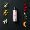 Verdant Blossom fragrance oil - Candle Shack aluminium bottle with dried botanicals on a dark slate background