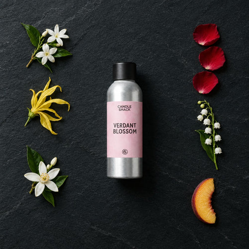 Verdant Blossom fragrance oil - Candle Shack aluminium bottle with dried botanicals on a dark slate background